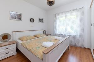 Postel nebo postele na pokoji v ubytování Vila Lavanda