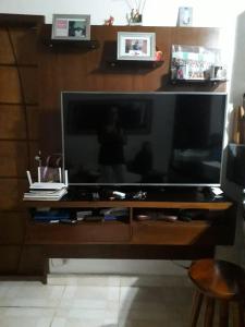 Телевизия и/или развлекателен център в Casa de Temporada no Paraíso Guaraú