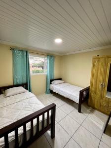 Tempat tidur dalam kamar di Dushi Experience