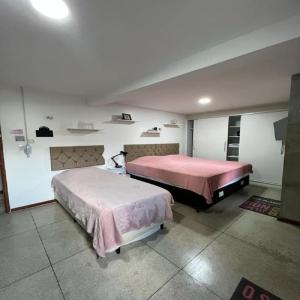 מיטה או מיטות בחדר ב-STUDIO 202 | WIFI 600MB | RESIDENCIAL JC, um lugar para ficar.
