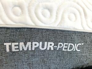 a close up of the word tempur pedic on a mattress at Limeridge Mall - Open Concept in Hamilton