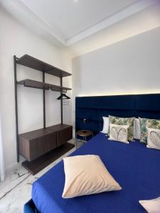 Letto o letti in una camera di Aries Suite Pompei