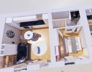 a model of a small apartment with a room at Les Belles Pierres - HyperCentre in Amboise