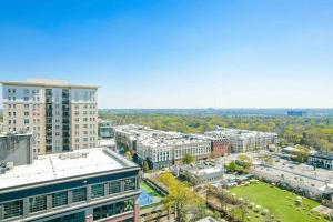 an aerial view of a city with tall buildings at The Bleu Oasis in Atlanta