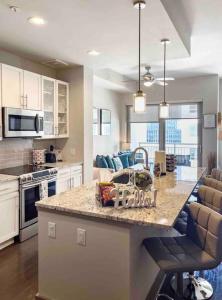 A kitchen or kitchenette at Modern Midtown Oasis