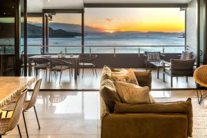 a restaurant with a view of the ocean at Edge Apartments on Hamilton Island by HIHA in Hamilton Island