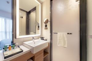 Vannituba majutusasutuses Hampton by Hilton Zhengzhou High-Tech Zone