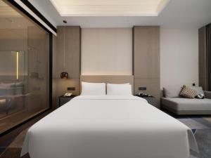 Postel nebo postele na pokoji v ubytování Crowne Plaza Dujiangyan by IHG