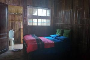Postel nebo postele na pokoji v ubytování Doi PuMuen LAHU Homestay + 32 fotografií