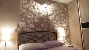 Postel nebo postele na pokoji v ubytování Apartments Dvor