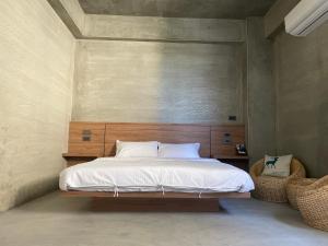 Postel nebo postele na pokoji v ubytování 沐目家 Xiang Jia Homestay