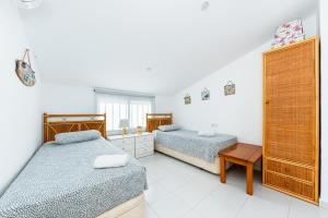 Posteľ alebo postele v izbe v ubytovaní Bungalow Sunrise Europa
