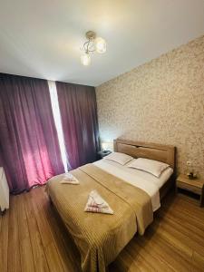 Rúm í herbergi á Label Apartment
