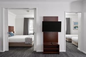 Letto o letti in una camera di Quest West End