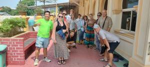 a group of people standing outside of a building at Ringo's Foyer in Melaka