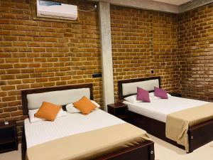 Katil atau katil-katil dalam bilik di Cielstar Resort