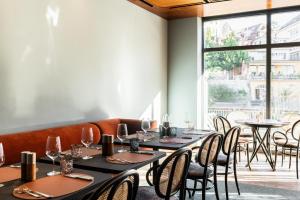 Restoran või mõni muu söögikoht majutusasutuses Hotel Aare Thun