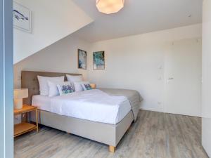 Postel nebo postele na pokoji v ubytování Apartment "Zauberblick"