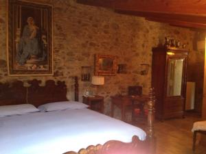 Postel nebo postele na pokoji v ubytování B&b di Charme Palazzo Lambertenghi