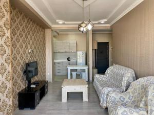 พื้นที่นั่งเล่นของ Apartment in Tbilisi Eristavi