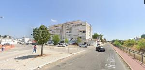 a view of a city street with a building at Olhao Apartment in Olhão