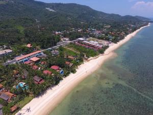 an aerial view of a beach with houses and the ocean at Bangpo Village Tiny Country Beach House in Koh Samui 