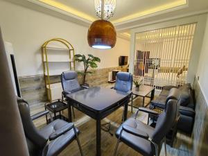 Istumisnurk majutusasutuses Zhangjiajie Borui Hotel - Tianmen Mountain 张家界天门山泊睿庭院酒店