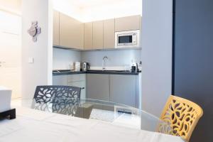 Kjøkken eller kjøkkenkrok på Arò Design Suite
