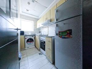 Abu Hail Star Residence - Home Stay的厨房或小厨房