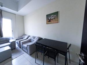 Abu Hail Star Residence - Home Stay的休息区