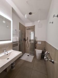 Koupelna v ubytování Hotel Asterix