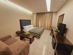 Sjónvarps- og/eða afþreyingartæki á Verdun Suites Hotel