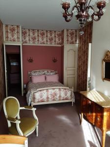 Ένα ή περισσότερα κρεβάτια σε δωμάτιο στο L'Appartement