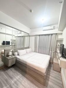Postel nebo postele na pokoji v ubytování Apartement 2BR sky house BSD