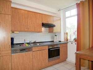 Küche/Küchenzeile in der Unterkunft Haus Roland- Whg 23 mit Schwimmbad und Sauna