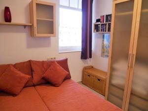 Ein Bett oder Betten in einem Zimmer der Unterkunft Haus Roland- Whg 23 mit Schwimmbad und Sauna