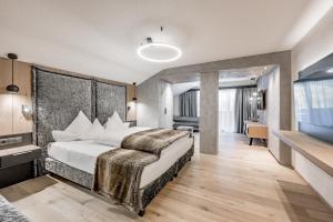 Postel nebo postele na pokoji v ubytování Hotel Grauer Bär + 37 fotografií