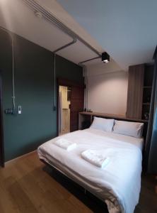 Postel nebo postele na pokoji v ubytování N5 Ratchawong Hostel