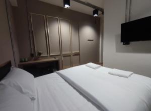 Postel nebo postele na pokoji v ubytování N5 Ratchawong Hostel