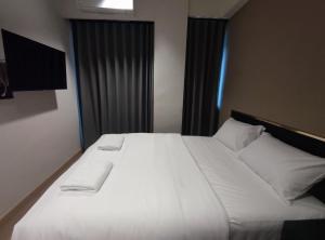 Postel nebo postele na pokoji v ubytování N5 Ratchawong Hostel