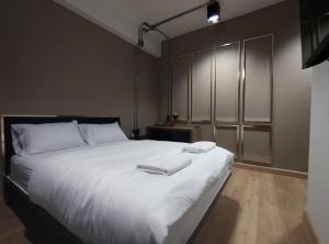 Postel nebo postele na pokoji v ubytování N5 Ratchawong Hostel