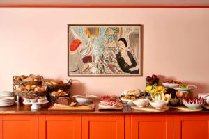 a buffet of food on top of a table at The Bloomsbury Hotel in London