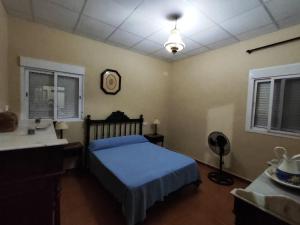 Postel nebo postele na pokoji v ubytování Casa Rural Mesa del Lobo Perita + 9 fotografií