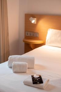 Posteľ alebo postele v izbe v ubytovaní U-Sense For You Hostel Sevilla