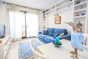 TV a/nebo společenská místnost v ubytování LITORAL COSTA DORADA - CANCUN Salou