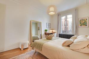 Voodi või voodid majutusasutuse Luxury Cocon by Les Maisons de Charloc Homes toas