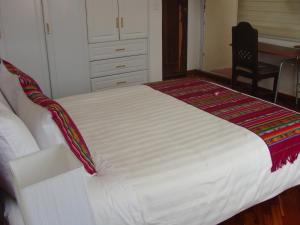 Hotel Sumaq Kayにあるベッド