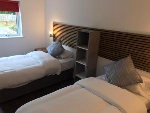 Postel nebo postele na pokoji v ubytování A Selection of Self Catering Holiday Homes at Kilcloon Cottages