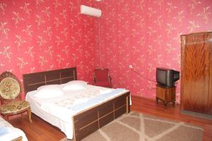 Postel nebo postele na pokoji v ubytování Guest House Nona
