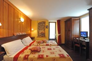 Letto o letti in una camera di L'Ancien Paquier Chambre D'Hotes